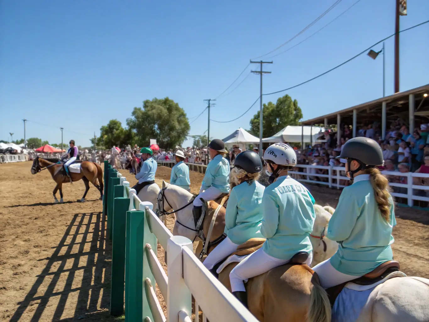 A CAVAL'CANTAL-organized equestrian event, showcasing riders of different ages and skill levels competing in a friendly and supportive atmosphere.